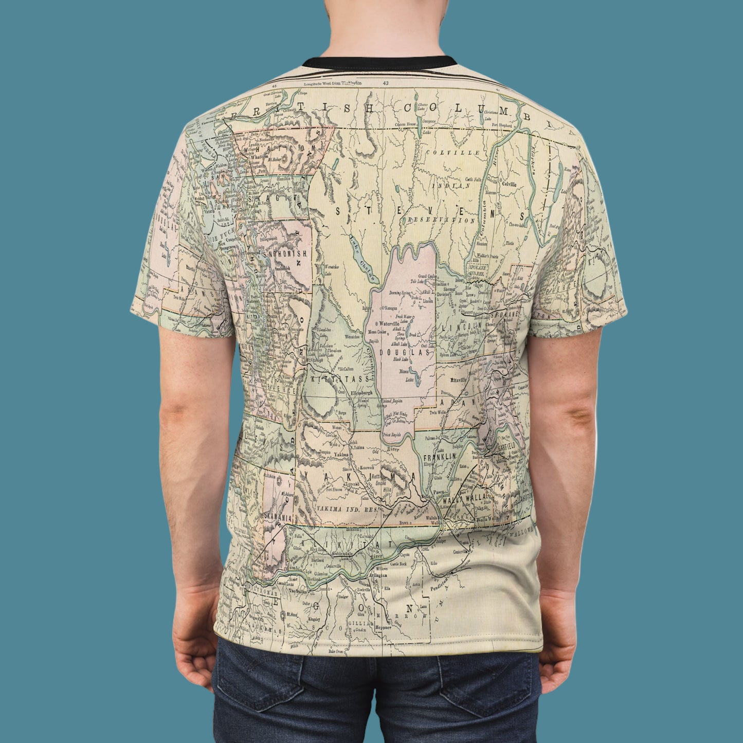 Person wearing a t-shirt with a map design on a white background
