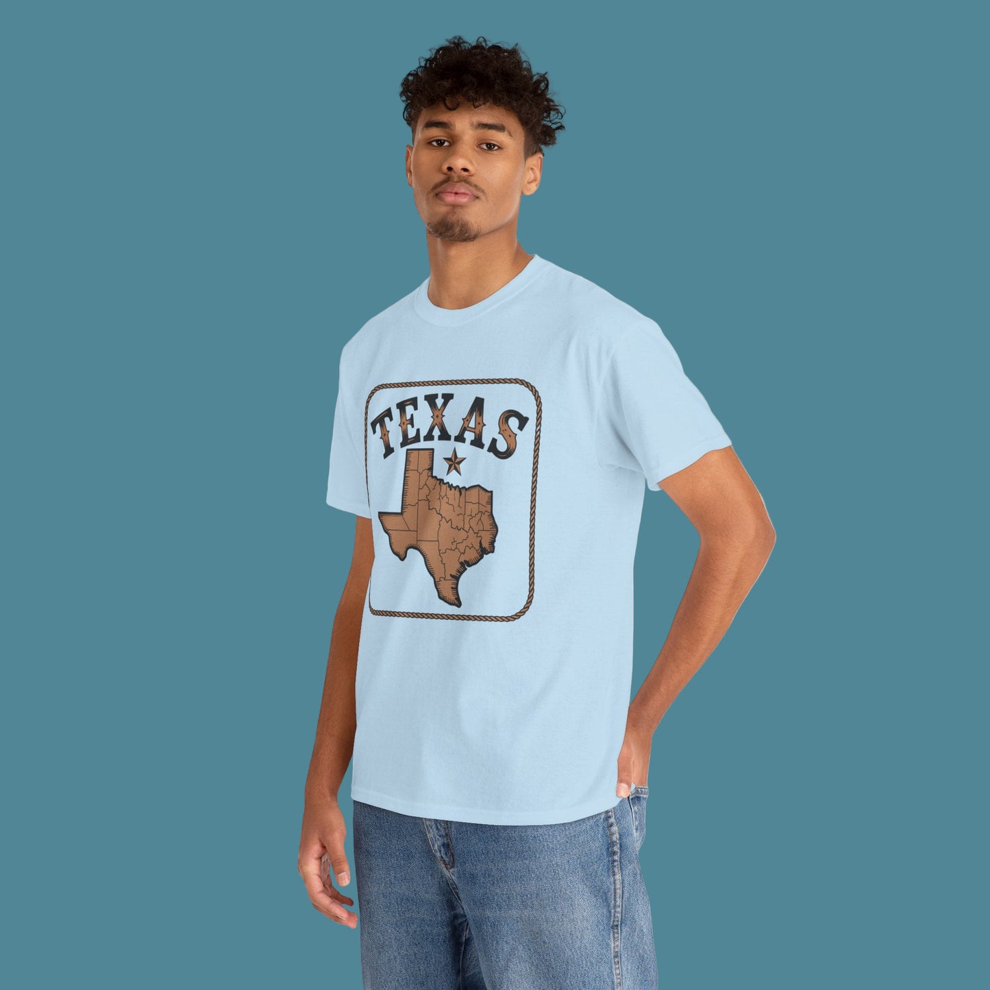 Person wearing a light blue t-shirt with 'Texas' design on a white background