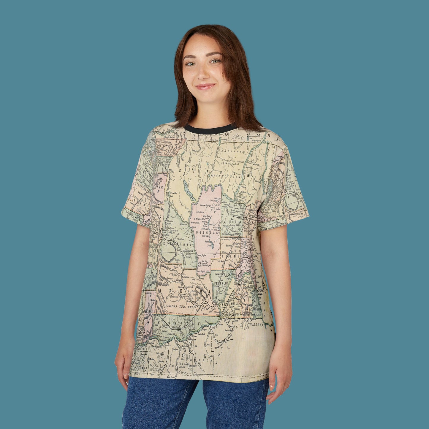 Woman wearing a map-patterned t-shirt on a white background