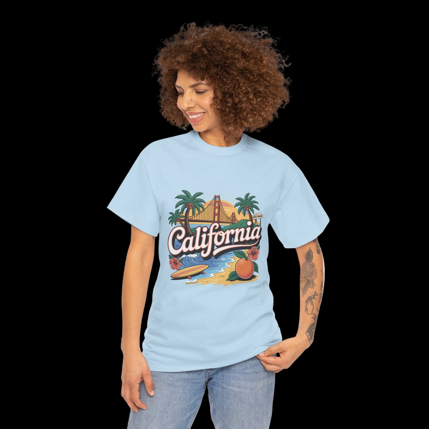 Woman wearing a light blue t-shirt with a California graphic design on a white background