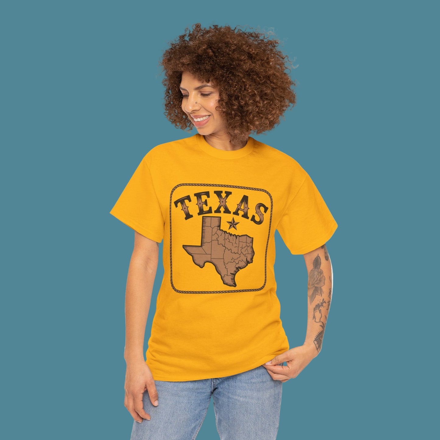 Woman wearing a yellow 'Texas' t-shirt with a map design on a white background