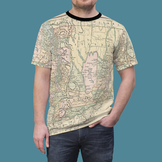 Person wearing a t-shirt with a map design on a white background
